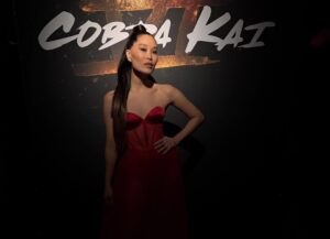 Alicia Hannah Instagram - cobra kai never dies❤️❤️❤️❤️ 

premiere look
styled by @benjaminholtrop 
makeup @karayoshimotobua 
hair @yumabastet 
style assist @emilykejohnson
​gown - @coral_castillo
jewelry - @kylechandesign @stephaniegottlieb
shoes - @charleskeithofficial