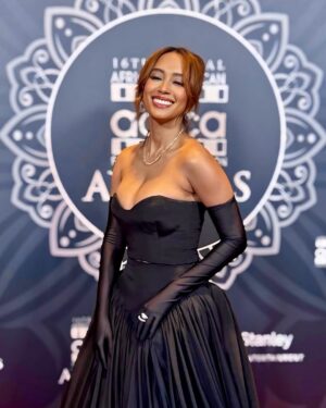 Andy Allo Instagram - Last night at the AAFCA Awards was nothing short of magical. ✨

I had the honor of presenting Best Animated Film to Wild Robot alongside the legendary Floyd Norman, whose work as an animator shaped my childhood. Standing next to someone who created the blueprint of my earliest memories was surreal and a moment I’ll never forget.

Being in a room filled with such iconic storytellers was humbling, but meeting the incomparable Aunjanue Ellis-Taylor? A dream come true and so unexpected! Also… I think I have a little crush on @ray8fisher. 🙈 Seriously, he’s incredible.

I truly felt like a princess in @miscreants__ . Huge thanks to my incredible Glam team: @theonlycm123 for the flawless hair, @taylourchanel for the stunning makeup, and @ldotstyle & @tsmgofashionrental for styling! 

Grateful for nights like these. 🖤 

#AAFCAAwards #BlackExcellence #HollywoodDreams #MiscreantsDesign #GlamTeamMagic #AAFCA2025