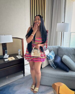 Anita Fabiola Instagram - Never on a budget in my @fashionnova Lily textured mini dress