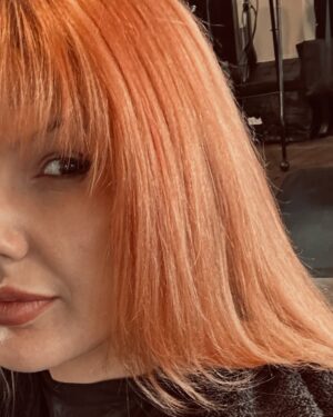 Ashley Leechin Instagram - ‘It was the end of an era but the start of an age’. 
🧡🔥💋

This may not be much of a change for some & many may not like it (I am not here to please you)…but for someone who has been blonde (every shade) the majority of their life…it is a HUGE change.

Blonde has always been such a beautiful color on me (no matter the shade and I experienced them ALL 😸) but ginger/copper is my ‘IT’ color. I have truly found the color that ignites my personality and my soul. Also, it looks INCREDIBLE with my red lips…I may never take it off? Jk 👀💋

I wanted to also share my inspiration for transitioning to red. I have always had a deep passion for the color red in general. Let’s face it…I wear red lipstick, red nails, red clothes, my wedding ring is red haha need I go on? 🤪 But when researching the PERFECT ginger shade, there was no question about it… my main inspiration came from Kirsten Dunst during her Spider-Man 2 era. Her red had such a beautiful glow & just brought out her complexion. I also drew inspiration from Molly Quinn & Isla Fisher. They are some of my favorite ladies & they all wear red best & it has shown! 

All to say, I am grateful for everyone who has stayed throughout this journey & anyone new joining. I am more than just my hair & lipstick of course but it is my personality forever and I am going to let it shine brighter than ever. 🧡💋

#newhaircolor #haircolorgoals #haircolorchange #newhair #gingerhair #copperhair #redhair #blondehair #haircolorinspo #redhead #actorsofinstagram #endofanera