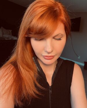 Ashley Leechin Instagram - ‘It was the end of an era but the start of an age’. 
🧡🔥💋

This may not be much of a change for some & many may not like it (I am not here to please you)…but for someone who has been blonde (every shade) the majority of their life…it is a HUGE change.

Blonde has always been such a beautiful color on me (no matter the shade and I experienced them ALL 😸) but ginger/copper is my ‘IT’ color. I have truly found the color that ignites my personality and my soul. Also, it looks INCREDIBLE with my red lips…I may never take it off? Jk 👀💋

I wanted to also share my inspiration for transitioning to red. I have always had a deep passion for the color red in general. Let’s face it…I wear red lipstick, red nails, red clothes, my wedding ring is red haha need I go on? 🤪 But when researching the PERFECT ginger shade, there was no question about it… my main inspiration came from Kirsten Dunst during her Spider-Man 2 era. Her red had such a beautiful glow & just brought out her complexion. I also drew inspiration from Molly Quinn & Isla Fisher. They are some of my favorite ladies & they all wear red best & it has shown! 

All to say, I am grateful for everyone who has stayed throughout this journey & anyone new joining. I am more than just my hair & lipstick of course but it is my personality forever and I am going to let it shine brighter than ever. 🧡💋

#newhaircolor #haircolorgoals #haircolorchange #newhair #gingerhair #copperhair #redhair #blondehair #haircolorinspo #redhead #actorsofinstagram #endofanera