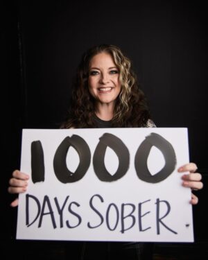 Ashley McBryde Instagram - 1,000 days, 1,000 moons. 
1,000 hangovers skipped. 
1,000 drunk “I’m sorry’s” I didn’t have to say. 
1,000 times in a row I made the choice to not pick it up or not miss it when the smell crossed my nose. 
1,000 times I have shown that the power of the love of a song and the love of the road are stronger than the pull to ever go back to who I was. 
1,000 “I love you’s” I  say to my reflection.  I see the woman I am now and the woman I am on my way to being and I have love and compassion for the woman I was and I care for her daily.  

Wherever you are in your journey, day 1, day 0…. Day 400 or day zero again for the 10th time. It is worth it. Every day is a milestone. 
Every version of you was necessary to be who you are now. So love them.