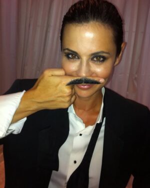Catherine Bell Instagram - Such a fun shoot with @michaeldoven way back when!! The suit/slick hair/mustache was an home to a Herb Ritts/Michelle Pfeiffer shoot 🖤🤍