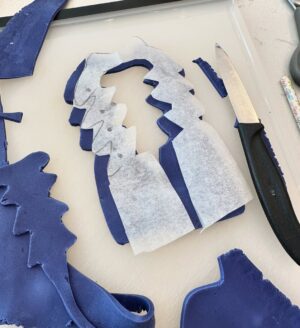Charlotte Hawkins Instagram - The grand reveal of my trainer cake! As my husband Mark is running the London Marathon for @mndassoc I wanted to do my bit for a fundraising event... and had a bit of a marathon cake-making session inspired by one of his trainers! 👟 I watched a lot of YouTube videos in preparation, having never done this before - but to be honest I’m not sure I’d recommend undertaking it unless you have a spare 12 hours or so 🤣 but here is my method just in case! Not quite ‘Is it Cake’ level but at least it tasted good!! 
I put this on my stories as I was creating it - a big thanks for all the support, it got me through it!! 
• the inspiration
• an awful lot of cake mix
• 4 cakes and the templates - ended up needing 6 cakes!
• Sooo much buttercream….
• Bit of a pit-stop along the way 🤣 
• taking shape but it looks more like a clog at this stage!
• Sticking it all together with jam and buttercream, not the prettiest but it does the job
• Resorting to raiding Ella-Rose’s play-doh box for some modelling tools - a bit of a wash and they worked a treat! 😂
• an awful lot of fondant needed 
• starting the process of sticking it on
• the professionals have what’s called a ‘texture mat’ - I have a cheese grater… 
• templating the tricky sections
• shaping it into the finished article - don’t forget to thread those laces!!
Good luck if you try it 😂 
#cake #isitcake #cakemodelling #cakecraft #mnd #mndassociation #fundraising #londonmarathon