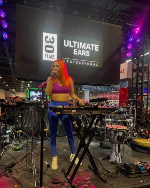 Chastity Ashley Instagram - Playing NAMM Show for Ultimate Ears’ 30th anniversary last month was a blessing that is still stirring my soul. I’ve poured my heart into this life—spinning as a DJ, laying down beats as a drummer, and belting out vocals—nights where I’d wrestle doubts in the dark, wondering if I could carry it all.  Ultimate Ears then came in like a warm embrace, washing those fears away. Their gear didn’t just hold me up; it set my spirit free—every groove I could swim in, every note a piece of my truth. When I was asked to play their stage, celebrating 30 years of their magic, I felt chosen—humbled to my heart. I was in LA less than 24 hours, pouring everything I had into that set, then racing off, boarding a plane two hours later for the next show. That fleeting day was a sweet, soul-deep fire. The team? Beyond remarkable—they’re kinfolk who lift me high in the rush. @ultimateearspro @ptone1 

Custom In-Ears @ultimateearspro 
Drums @rolandglobal 
Decks @pioneerdjglobal @pioneerdjusa 
Foot Pedals @boss @rolandglobal