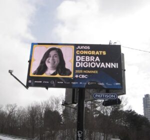Debra DiGiovanni Instagram - Baby’s first billboard! @thejunoawards @counterfeitpics 🇨🇦🇨🇦🇨🇦