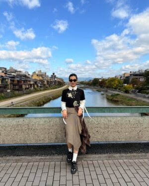 Eman Suleman Instagram - Jamil insisted my first Japan post be with him, my jaanu, without whom this trip would not be possible. Unfortunately, we barely have any pictures together, partly because I was mostly working, and partly because Japan moves so fast, there was hardly any time to pause. By the time the overwhelmingness of it all subsided, it was already time to leave. Sad. 
There’s so much from this trip to share beyond just photos of me looking like a cast member of Yellowstone and unironed clothes. Slowly, as I find my bearings and adjust from 30,000 steps a day to barely 2,500, clean air to smoggy Lahore, I’ll get to it.
