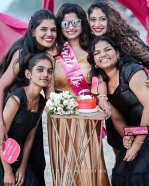 Janaki Sudheer Instagram - Ready to pop the bubbly and celebrate love🖤🩷
📸@lefteye_weddings 

#bridetobe #bride #black #blackpink #beach #destination