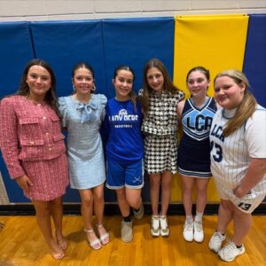 Jennie Finch Instagram - P was honored to represent her 6th grade class on Court. She was over the moon excited to walk with Casey, it was the sweetest! 🥰 She had a quick 4 min change from her basketball uni to her dress & heels. She’s a gamer! We couldn’t be more thankful for our village for their love & support always. 💙🤍 P wanted to play this song on the way to the game… May she always hold Psalm 23 in her heart. 🙏🏽