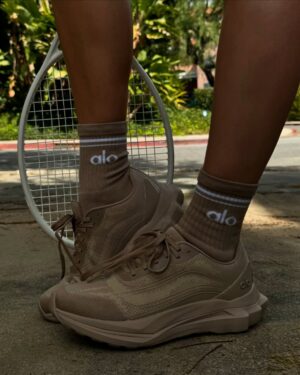 Joy Corrigan Instagram - The new @alo runner gravel color launch 👟 is here and I’m obsessed 🚀😃🫶🏻 #aloRUNNER
