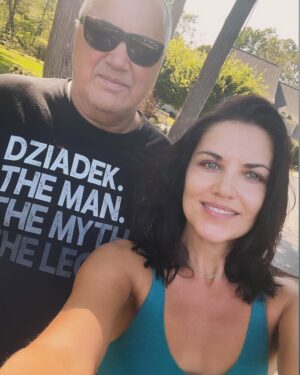 Marika Domińczyk Instagram - This is the last picture I took with my Dad 8/30/2022. I made us stop hugging goodbye so I could take it…That face he’s making? That’s his “ok fine. Fuck, just do it” face. The “I don’t understand you sometimes, but i love you, you stoop, face”… I miss that face… 🌊💔. Now he’s #there and we’re #here . 2yrs in and counting, But I’m counting less! Which is progress (Did you know you can cry consecutively for over 100 days no problem?!my sisters & I found that out year 1) I’m #smiling more this year and I’m actually going back to work 🤩🎬🎉 and I will say he’s throwing me more #signs( 17’s🦉’s) which Is a really nice. Thinking that he’s taking care of  of LucyGoose 🐶 and Wesley 🩵 and Ola & her boys ❤️🩵🩵, that they are all together brings me some #comfort (you still suck tho #grief you do.) Tato #kochamcie I #tęsknię za tobą His name was Miroslaw Mikołaj Dominczyk - Mirek as his friends called him #Dziadek the #man the #myth the #legend 12/6/1953 - 2/8/20223… #honor #remember #normalizegrief 💔🌊❤️