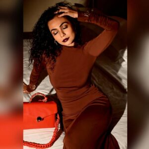 Meghana Kaushik Instagram - HOT CHOCOLATE with Cranberry anyone??? 🤎🖤🤎
.
.
Bag @hidesignhq
.
.
.
( winter, winter fashion, date Night, classy, formal , sexy , chic, brown, red, ootd) 
.
.
.
.
.
.
.
.
#ootd #datenight #winteroutfit #chic #slay #meghanakaushik #brown #fyp #explorepage #explore