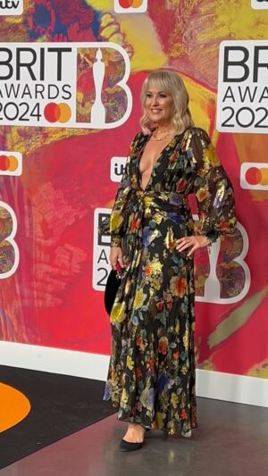 Nicki Chapman Instagram - What a difference a year makes 😉

This time last year - having the best evening with @aritanderson @brits 2024. Thanks to Tony H @warnermusicuk 

Now? Watching on catch up last night’s show… Attire? Trackies sans makeup (but I am wearing a bra this time) plus tea & toast 

Massive congrats to all the winners & organisers (well done DC 👏) 

@aritanderson 
Glam @wonderlandhairandmakeup 
Hair @hairbyninanikol 
Frock of dreams @rixo (borrowed)