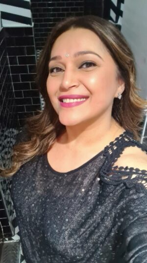Niki Aneja Walia Instagram - Life is a mirror: if you frown at it, it frowns back; if you smile, it returns the greeting" 

P.S. I love my bindi with my western look 😊 Do you?