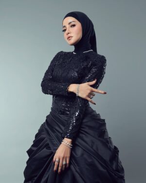 Olla Ramlan Instagram - Me for @allemanagement #allemanagement2025

Dress from @julianto.official

Jewelry from @clemenceellery

MUA by @arie_khayz @ariekhayzmakeup

Hijab by @ida_hijabstylish 

#olramstyle