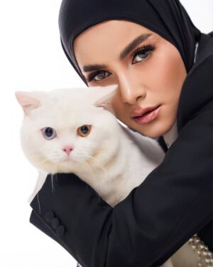 Olla Ramlan Instagram - “Style is far more than the clothes you put on; it’s the energy you carry, the confidence you wear, and the way you make others feel. 
Fashion may dress your body, but style is what dresses your soul. It evolves with you — shaped by your experiences, your scars, your victories. 
When you wear something that feels like you, it’s not just an outfit; it’s a declaration of self-love.”

BEAUTIFUL CAT - @zowzow.royalmansion 
PHOTOGRAPHER - @mozawahyu 
SUIT - @julianto.official 
MAKE UP - @aulia_neosevituri 
HIJAB - @jatupurwanti 
OR TEAM - @brotheralle @mini_saputri @novitadewi.official 

BEST TEAM! 🔥#olramstyle