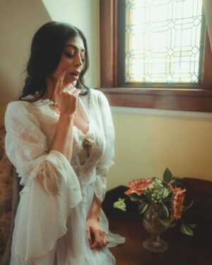 Parvati Melton Instagram - Some prayers are silent, but they shake the soul just the same. Heaven doesn’t feel so far when peace lives within. 🕊️🪽🤍 At @victorianbelleweddings for the workshop by @cobaltstudiospdx x @darchivenetwork event
Photographed by the amazing @asherrainphotography 
A day full of magic, mood, and muses
🏰🕯️⛪️✨