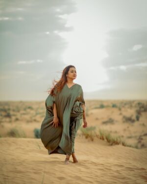 Poojitha Instagram - “Sunlight on my face, smile on my heart” ❤️

Thank you @razee_rasheed @seven_days_media for choosing this atmosphere and thank you @_kirankm_ for these captures 🩷🩷

#dubai #desert #nature #love #actress #poojithamenon