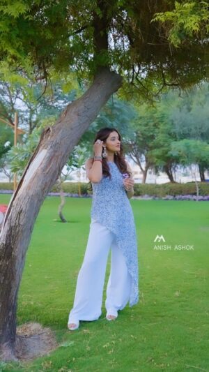 Sowmya Menon Instagram - Wrapped in whispers of the sky, rooted like the ancient tree where elegance meets nature’s poetry. 🌿💙

👗 @resha_by_rehana_shana
📷 @anish_k_ashok
💄 urs truly...

#sowmyamenon #reels #actorlife #kfi #mollywood #tollywood #kollywood #ownyourstyle #fashionstatement