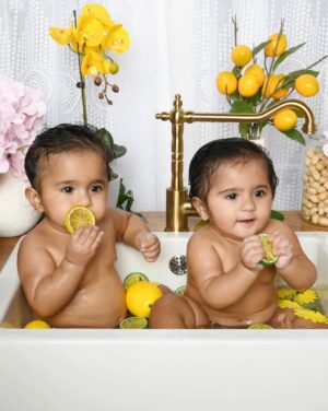 Swati Verma Instagram - OMG! 🥰 Valentina and Vanessa having the cutest little bath in the sink, playing with lemons! 🍋👶👶 I still can’t get over how adorable they are looking! 🥹💛

 📸 @almahastudio

 #TheNandaTwins #playtime #twinssisters #twinlife