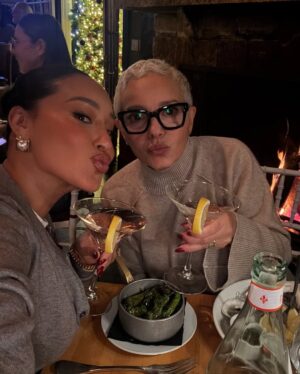 Adrienne Bailon-Houghton Instagram - You know I love lists… 
1. a few of my favorite things… 🎶♥️🎄
2. my album “New Tradiciones” is back! new cover artwork and a little @everjames interlude lol. 
3. red roses for the holidays… who am I?! loving them. thank you @israelhoughton 🥀 
4. tablescaping for the holidays… excited to host our family “noche buena” again this year! 
5. we are officially into the grinch! @everjames is obsessed & Jim Carey deserved an Oscar!
6. grinch pancakes: gluten free pancake mix, spinach, vanilla, cinnamon, eggs & milk. blend!
7. they are shockingly delicious! and they have a lot of spinach in them… but, you don’t taste it! 🌲
8. i love my family @luciaparker @jakesalomon @pinkparkers the most thoughtful! @petiteplume
9. ummm the ultimate holiday bop! and of course @lana_hawatmeh’s fav song to sing really loud! lol.
10. the things i find and love @homegoods - this was definitely @everjames approved! And cocoa scented.
11. So we had to try it as a family lol. looked gross but it was so much fun! i am such a boy mom.
12. we jumped in the shower afterwards… but, @everjames did not want me to drain the tub! 
13. this is me negotiating with a 2 year old… and yes his onsie is also… the grinch. we all have them!
14. and hopped back in bed to watch… you already know… it was honestly my dream lazy morning lol.
15. more @skims holiday treats! obsessed.
16. i absolutely love the smell of pine… love buying fresh wreaths, garland & mini trees for the house! 
17. holiday dinner dates w/ @israelhoughton - that feel like I’m in a @hallmarkchannel movie 🎥 
18. wood burning fireplaces, while listening to holiday tunes on a double date with my parents! 
19. we arrived first… so of course i had to take a pic.
20. the woman that always made the holidays so special for us… the reason I had the best childhood, traditions & memories. i love you @nyricanmama ♥️