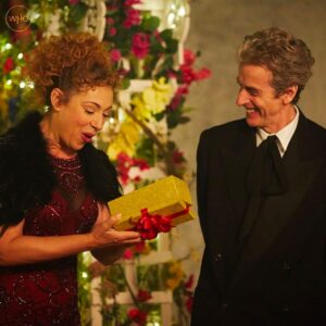 Alex Kingston Instagram - Hello Sweeties…
all this traveling through time and space seems to have made me a day late!
Happy (belated) 20 year anniversary to new who! What a privilege to have been part of something so wonderful and worked with such incredible beings along the way. Here’s to many more adventures!
Spoilers… 💋💄