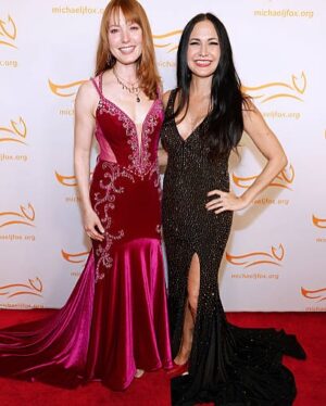 Alicia Witt Instagram - a most extraordinary evening celebrating @realmikejfox and @michaeljfoxorg. it was incredible to be in the presence of proof of what happens when someone chooses to see an obstacle as an invitation to do great things - on a scale like this. 

$2.5 BILLION has been raised for #parkinsons research thus far - leading to massive and meaningful changes. last night’s event alone raised over $1M. 

i’m so grateful i got to be there at #acountrything last night in #nashville and grateful i got to shake michael j fox’s hand. beautiful powerful soul. may we all take inspiration from this living hero. 

as MJF says - the science is still ahead of the money. when they raise $1B, there is $1.5B needed for the research. now there are tests available to diagnose parkinson’s ahead of the symptoms. that’s one step (a million steps) closer to a cure. and medicines and treatments available now that could only have been dreamed of before. 

we got to hear @chrisstapleton @littlebigtown and @dustyslay, hosted by #williegeist. 

best date: @lotuseye 🩷🖤
both of us wore @johnathankayne 👗 
 i wore jewels by @lockandkey_14 
makeup by meeeee
expert dress alterations by @sophiethetailor 🪡