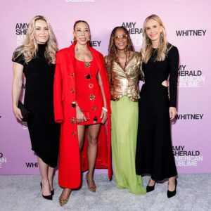 Amy Sherald Instagram - Still taking it all in…AMERICAN SUBLIME @whitneymuseum 🩵

This moment is bigger than me—and I’m honored to share it with all of you. #whitneymuseum #amysherald #americansublime #adventuresofkristinandamy 

Makeup @laramiemakeup  Hair @myssmonique  Red Dress Custom @harbison.studio With Harbison jewelry Second Opening Bracelet and Earrings @dinosaur_designs