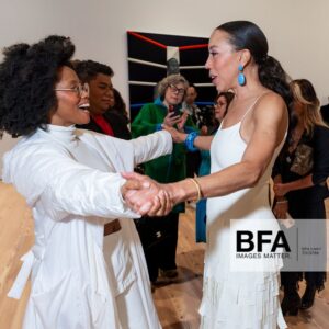 Amy Sherald Instagram - Still taking it all in…AMERICAN SUBLIME @whitneymuseum 🩵

This moment is bigger than me—and I’m honored to share it with all of you. #whitneymuseum #amysherald #americansublime #adventuresofkristinandamy 

Makeup @laramiemakeup  Hair @myssmonique  Red Dress Custom @harbison.studio With Harbison jewelry Second Opening Bracelet and Earrings @dinosaur_designs