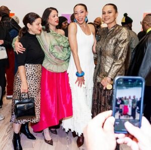 Amy Sherald Instagram - Still taking it all in…AMERICAN SUBLIME @whitneymuseum 🩵

This moment is bigger than me—and I’m honored to share it with all of you. #whitneymuseum #amysherald #americansublime #adventuresofkristinandamy 

Makeup @laramiemakeup  Hair @myssmonique  Red Dress Custom @harbison.studio With Harbison jewelry Second Opening Bracelet and Earrings @dinosaur_designs