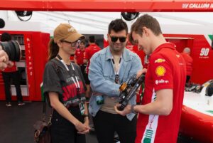 Angela Sarafyan Instagram - Thank you ❤️ @prema_team for this amazing experience! Kill it today!!! 🏎️ 
First time at the @grandprix in my #sinners t-shirt 

#adrenalinerush 
🏎️🏎️🏎️