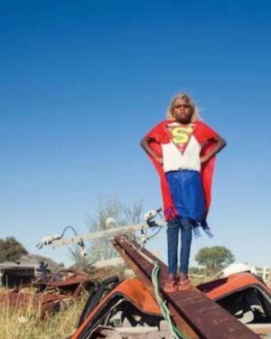 Annabel Crabb Instagram - So thrilled to read that this incredible image by @tonyalbert is to be included in the first ever Australian exhibit in the @rencontresarles this year - the world’s longest running photography festival I believe? The show is called “On Country: Photography From Australia” and runs July - October in Arles. Swipe for details and other brilliant Australian participants. 
I will never forget seeing this work and others in Albert’s Warakurna Superheroes series - I wandered into a Fremantle gallery with my friend @suedale1 and there they were, in all their extraordinary colours, leaping out of their frames and grabbing at me. How beautiful to think these works are gong to France to enthrall gallery-wanderers there. Thanks @photofestivalau and @sullivanstrumpf from whose Insta accounts I inexpertly copied these images, and congrats all.
Have a good day, champions ❤️