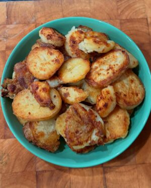 Annabel Crabb Instagram - Camp Fries. Boil a bunch of bog-standard washed potatoes whole, skin on, until they start to peel and crack. Drain. Let cool. Slice thickly and toss with seasoned flour (I like rice flour and you can use spices of your choice, cumin, smoked paprika, coriander all good)
Fry in butter and oil in a heavy pan until crispy and golden.
Salt and serve.
Also trading as: Sorry about the mean April Fools Day prank, kids*

*See immediately previous post