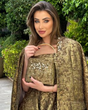 Annabella Hilal Instagram - A little bit of gold coming your way 💫 

My personal favorite from The Savoir Collection - @andotherstories 

Hair & makeup by @laloge_uae