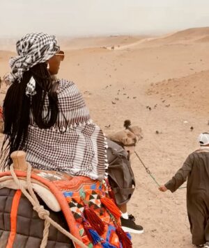 Catherine Kamau Instagram - Exploring The  ancient majestic Giza Pyramids  was a once in a life time adventure that truly exceeded my wildest expectations. The history behind the work that went into designing and construction the pyramids is mind blowing. I cross off this bucket list with overwhelming joy and pride thanks to my best friend & my odogwu 😂❤️.

#giza 
#blacktravel