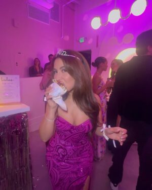 Cinthya Carmona Instagram - PROM 2025 👑 

Corsages, prom portraits, burgers, and a solid night of dancing with my sister Izzy for a prom themed party. 
(Last slide is us this AM #Mood) 
P.S: For my actual prom many years ago, I wore a similar dress style in Gold!!! 

Dress: @lulus