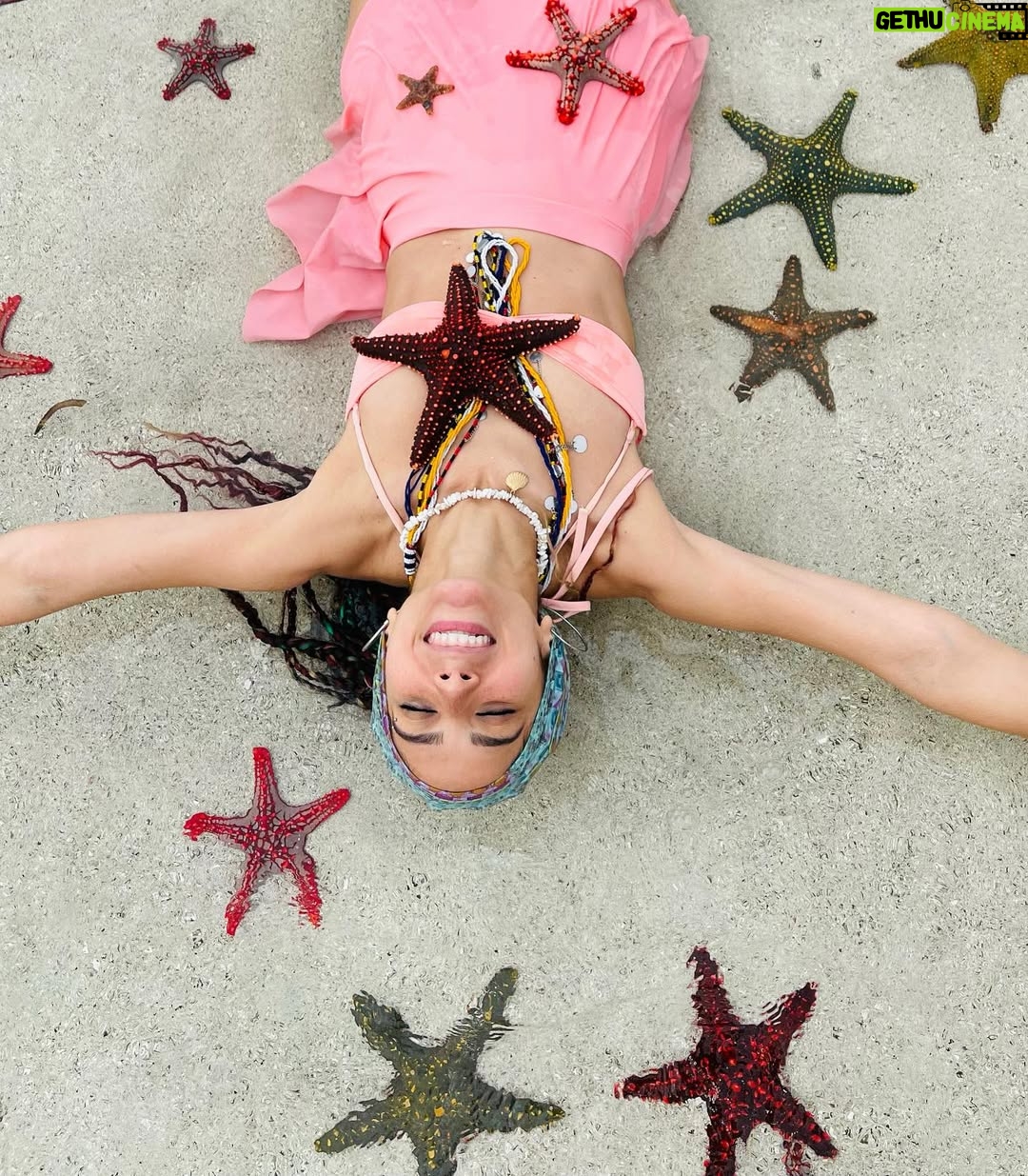 Dalia Shawky - 91.4K Likes - The secret is OUT. 🧜🏼‍♀️ 
I’m officially a MERMAID. ✨

9th slide tells you who announced the news. 🐚🥰
Also, little starfishie stole my heart away & the red studded one blew my mind away. سبحان الله 💫