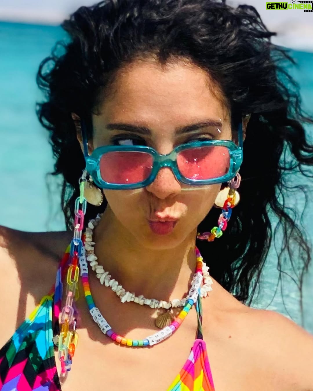 Dalia Shawky - 48K Likes - 🐚 🌊🧜🏼‍♀️☀️🎨🌈 يومكم ملون و لذود! 
A colorful splash across your feed to make your day a little more playful. 🤭 #SummerIsHoly #TheBeachIsMyLover
