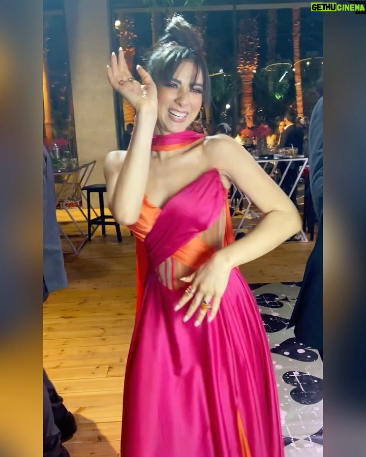 Dalia Shawky - 72K Likes - 900th post goes to celebrating love, with all its heart-melting beauty, dancing hearts and laughter intertwined with tears of joy. Here’s to my childhood bestfriend’s wedding, our Cindrella ~ Faru7i. 💗🧡

Thankful for my beautiful team: 
Custom made butterfly bridesmaid’s dress by the wonderful: @chl_maisonleon
MUA, inspired by the sunset: the lovely @sandrawilliammakeupartist 
Hair: @mostafa.elmasry.9
