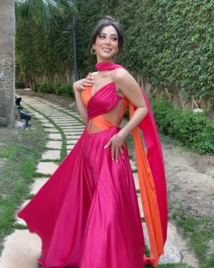 Dalia Shawky Instagram - 900th post goes to celebrating love, with all its heart-melting beauty, dancing hearts and laughter intertwined with tears of joy. Here’s to my childhood bestfriend’s wedding, our Cindrella ~ Faru7i. 💗🧡

Thankful for my beautiful team: 
Custom made butterfly bridesmaid’s dress by the wonderful: @chl_maisonleon
MUA, inspired by the sunset: the lovely @sandrawilliammakeupartist 
Hair: @mostafa.elmasry.9