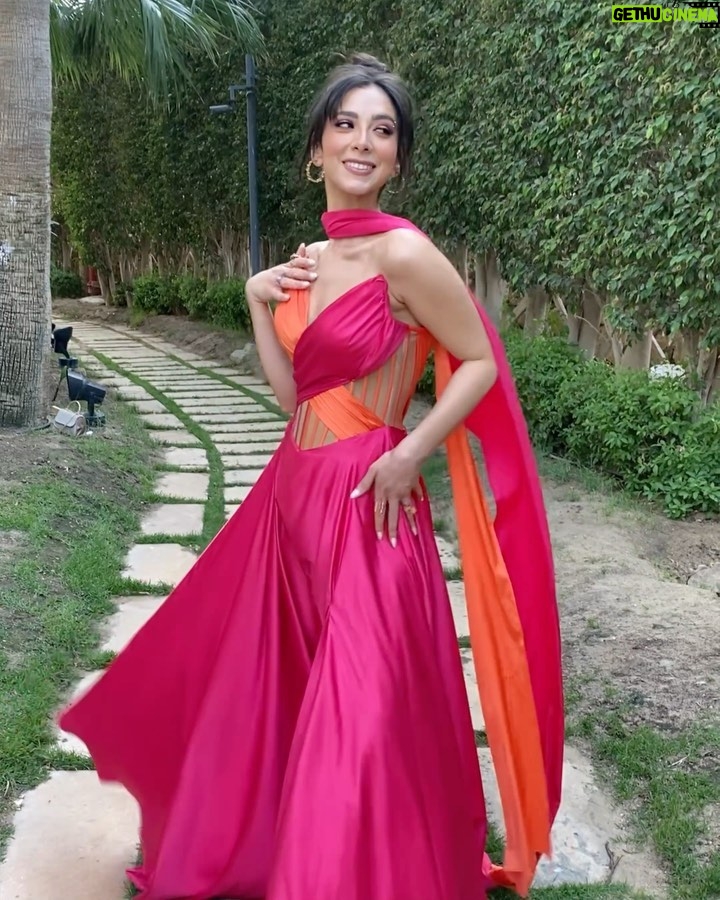 Dalia Shawky - 72K Likes - 900th post goes to celebrating love, with all its heart-melting beauty, dancing hearts and laughter intertwined with tears of joy. Here’s to my childhood bestfriend’s wedding, our Cindrella ~ Faru7i. 💗🧡

Thankful for my beautiful team: 
Custom made butterfly bridesmaid’s dress by the wonderful: @chl_maisonleon
MUA, inspired by the sunset: the lovely @sandrawilliammakeupartist 
Hair: @mostafa.elmasry.9