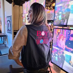 Danielle Fishel Instagram - This is my original Boy Meets World cast & crew jacket from the 93/94 season (my mom even wrote my name on the youth xl tag because 12 year old Danielle couldn't keep track of anything! 😂). Back in the day this merch didn't get much use - I wouldn't want to wear it out in public and make it seem like I was trying to draw attention to myself - but now I proudly wear it to a whole new generation of TV sets. Shows I no longer star in, but am lucky enough to direct. I'm so grateful to do work that I love with people I love! 💕