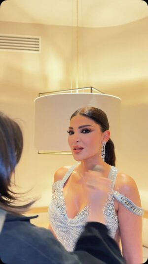 Dina Hayek Instagram - From new year concert in #akaba 
Happy new year lovers 🥰🥳
#jordan #newyearseve @amwajaqabafestival @samir.mawla 
Dress : @ramisalamoun 
Makeup: @sehammakeupartist1 
Hair: @asmarhorani 
Video by: @photographer_mahmod