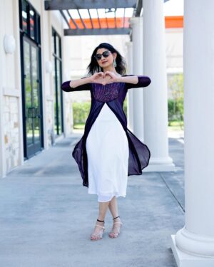 Divyaa Unni Instagram - Springing into sunshine, swaying in the breeze, and twirling in this beautiful dress
Thank you @leyandadesigns for this beautiful outfit @manikanda_rajan_ 
Clicked by @vvaranasiphotography