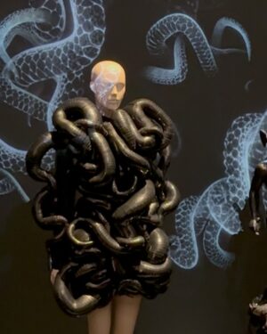 Fiona Xie Instagram - The Alchemy of @irisvanherpen @voguesingapore 

“I find beauty in the continual shaping of chaos which embodies the primordial power of nature’s performance,” Iris van Herpen once said—words that illuminated my understanding of her work at the nexus of ancient alchemy and @cern physics.

Her liminality is her genius. “I see technology as a tool to express the handwork better,” she explains, dissolving false binaries. When her kinetic structures breathe with the wearer, we witness her core philosophy: “Movement is my constant inspiration. Our human body is in continuous motion, as is everything around us.”

These undulating architectures manifest what philosopher Merleau-Ponty called “the flesh of the world”—the profound interconnectedness between perceiver and perceived. Her approach transforms rigid materials into liquid motion, embodying Bachelard’s insight that “matter is the unconsciousness of form.”

I remember showing my friend @grimes in that “Dune of Souls” creation at the met gala whispering “It would be a dream to wear these.” Then @voguesingapore @nat_tasha ‘s call came—Iris would dress me for the @artsciencemuseumsg retrospective. I swooned like a teenager locked lips in her first kiss. Manifestation is real. 

“Fashion is an expression of the zeitgeist, while couture is an expression of eternal beauty.” These words resonated as I stood transfixed clad in her “Architectonics” collection—embodying what Rilke meant by “living the questions” about our relationship with technology, philosophy, architecture, music, nature, and our bodies.

Draped in her vision, I understood: Iris van Herpen doesn’t design clothing. She designs portals to possibility itself.​​​​​​​​​​​​​​​​

Be transcended at @artsciencemuseumsg 
#IrisVanHerpen #ArtAndFashion #Metamorphosis​​​​​​​​​​​​​​​​ #Vogue