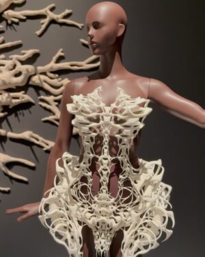 Fiona Xie Instagram - The Alchemy of @irisvanherpen @voguesingapore 

“I find beauty in the continual shaping of chaos which embodies the primordial power of nature’s performance,” Iris van Herpen once said—words that illuminated my understanding of her work at the nexus of ancient alchemy and @cern physics.

Her liminality is her genius. “I see technology as a tool to express the handwork better,” she explains, dissolving false binaries. When her kinetic structures breathe with the wearer, we witness her core philosophy: “Movement is my constant inspiration. Our human body is in continuous motion, as is everything around us.”

These undulating architectures manifest what philosopher Merleau-Ponty called “the flesh of the world”—the profound interconnectedness between perceiver and perceived. Her approach transforms rigid materials into liquid motion, embodying Bachelard’s insight that “matter is the unconsciousness of form.”

I remember showing my friend @grimes in that “Dune of Souls” creation at the met gala whispering “It would be a dream to wear these.” Then @voguesingapore @nat_tasha ‘s call came—Iris would dress me for the @artsciencemuseumsg retrospective. I swooned like a teenager locked lips in her first kiss. Manifestation is real. 

“Fashion is an expression of the zeitgeist, while couture is an expression of eternal beauty.” These words resonated as I stood transfixed clad in her “Architectonics” collection—embodying what Rilke meant by “living the questions” about our relationship with technology, philosophy, architecture, music, nature, and our bodies.

Draped in her vision, I understood: Iris van Herpen doesn’t design clothing. She designs portals to possibility itself.​​​​​​​​​​​​​​​​

Be transcended at @artsciencemuseumsg 
#IrisVanHerpen #ArtAndFashion #Metamorphosis​​​​​​​​​​​​​​​​ #Vogue