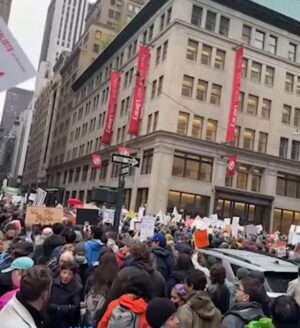 Gina Gershon Instagram - New York Resists! #handsoff our #democracy #freedom #bodies #education #rights even in the rain, thousands of people showed up to fight for our democracy and freedom. #nyc