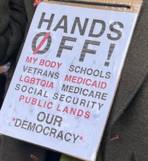 Gina Gershon Instagram - New York Resists! #handsoff our #democracy #freedom #bodies #education #rights even in the rain, thousands of people showed up to fight for our democracy and freedom. #nyc