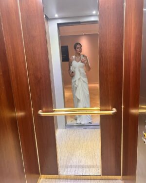 Hana Sheha Instagram - White dress, red lipstick, Diamond Set .. 
It must be illegal 🤍🤩❤️

Opening ceremony @fiffs.officiel
Thank you @dinouche.designs for my total look and diamonds 💎💎💎
Make up and hair by the talented @rimmake_up