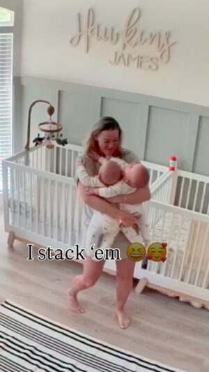 Jamie Otis Instagram - I’ve really mastered this double pick up so one twin isn’t left behind while I take care of the other baby.☺️ And they LOVE it when I carry ‘em both — I wonder if it’s bc it smushes them together like they were in my womb?!🥰😆

There’s nothing “ordinary” about being a twin mom. Everything I thought I knew and was confident in as a mommy to two singletons has been challenging with two.💙

The biggest challenge has been in the sleeping and eating department … but I dont know - it’s also simple things like just gathering all the kids up to go anywhere….its just all feeling a wee bit more difficult🤪

I really thought for sure breastfeeding the twins would be so easy bc I had an over supply with my last baby & I exclusively nursed each of my older two for one year - but I’m having to supplement with formula this time around.🍼

Thank God for formula!🙏

I don’t know why I feared sleep training this time around? I did a very gentle Ferber-like approach with both of my older two and it worked GREAT.

But this time around it’s like my confidence went out the window. 

It’s just that hearing my babies cry for even 1 min  hurts my heart - and as you can imagine if they’re both crying it’s double stressful. OR If they go one after the other it feels like they’ve been crying forever. it FEELS soul crushing - when really neither of them have cried for long.

We are on night 5 of sleep training tonight and although they each woke up once last night - the night before they slept the👏whole👏night👏 so I have HOPE we are turning a corner.🤞

Anyways, I’m just blabbering on now 🤪 … I know these hard times won’t last forever! We are really starting to get our groove already!👏👏❤️❤️

This whole twin mom thing is inevitably going to be a bit double the “trouble” but it’s also double alllllll the fun!💯… just look at their sweet smiles!🥰

#twinmom #twinning #twinsofinstagram #boymom #6monthsold #doubledouble #identicaltwins